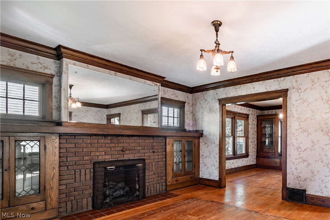 3839 Silsby Road Cleveland, OH 44111 - Photo 5 of 34 The living room has a fireplace (now with flanked by craftsman-style leaded glass built-ins.