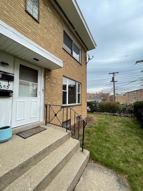 8653 Niles Center Road, Unit D Skokie, IL 60077 - Photo 1 of 8 a house view with a outdoor space