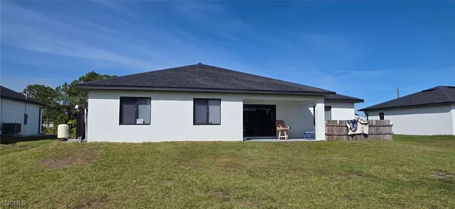 a front view of house with yard