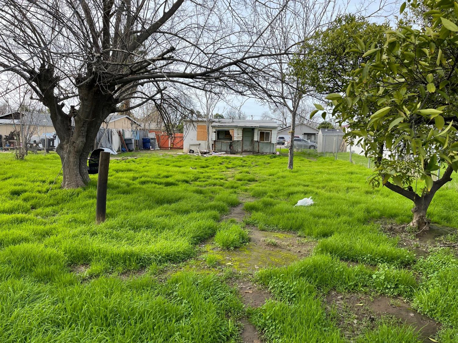 2425 South 10th Street Fresno, CA 93725 - Photo 11 of 12 a view of house with a backyard