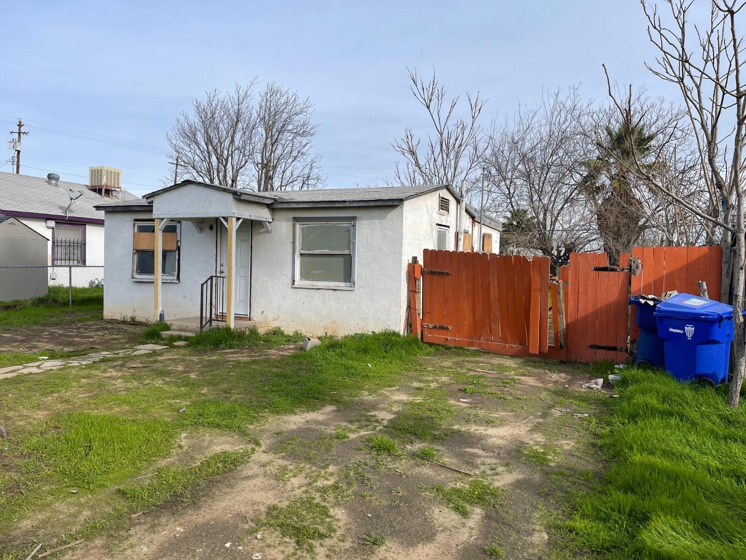 2425 South 10th Street Fresno, CA 93725 - Photo 2 of 12 a front view of a house with garden