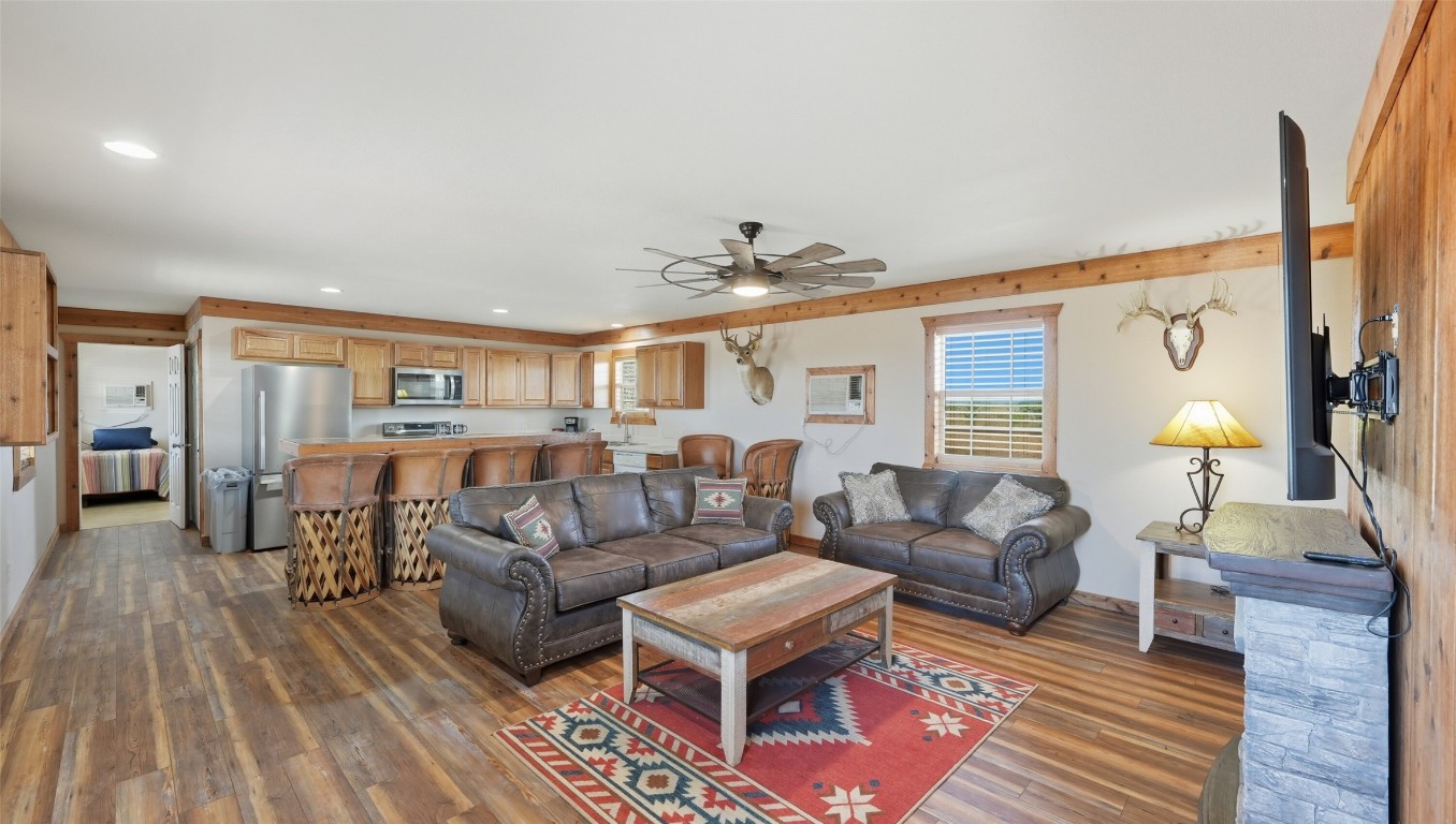0 Ranch To Market 3008 Ranch Brackettville, TX 78832 - Photo 13 of 40 a living room with furniture and wooden floor