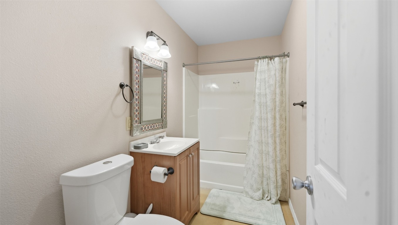 0 Ranch To Market 3008 Ranch Brackettville, TX 78832 - Photo 21 of 40 a bathroom with a sink a toilet a mirror and shower