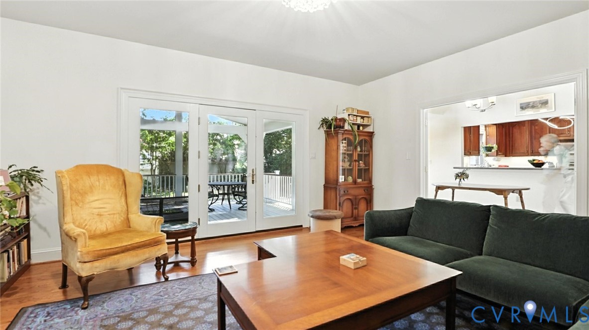 3321 Gloucester Road Richmond, VA 23227 - Photo 18 of 38 Living room featuring wood finished floors and fre