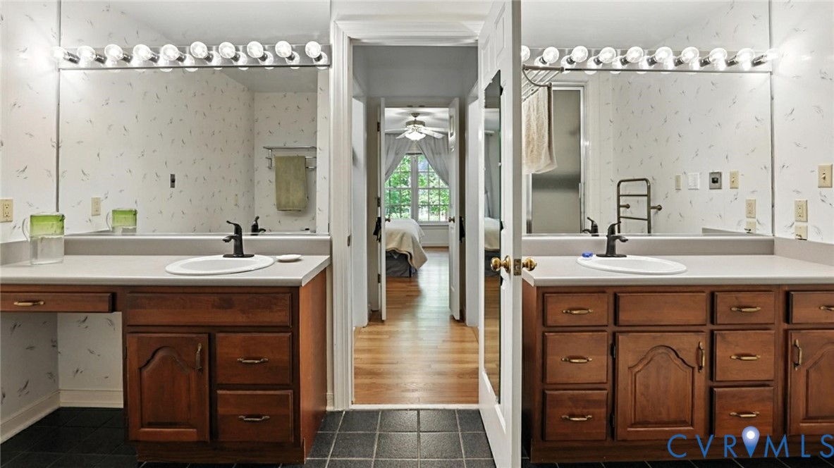 3321 Gloucester Road Richmond, VA 23227 - Photo 27 of 38 Bathroom featuring wallpapered walls, two vanities