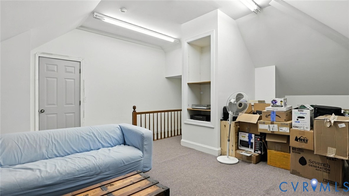 3321 Gloucester Road Richmond, VA 23227 - Photo 36 of 38 Sitting room with lofted ceiling and carpet
