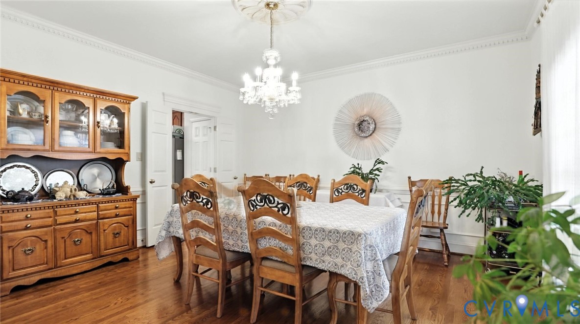 3321 Gloucester Road Richmond, VA 23227 - Photo 7 of 38 Dining room with ornamental molding, dark wood-sty