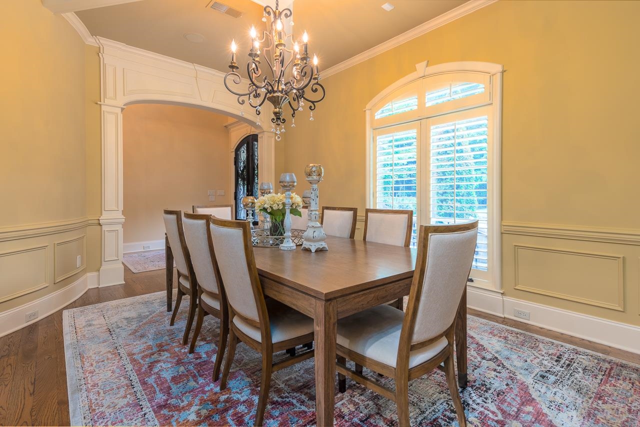 4600 Maple Glen Court Lakeland, TN 38002 - Photo 12 of 40 a view of a dining room with furniture and a chandelier
