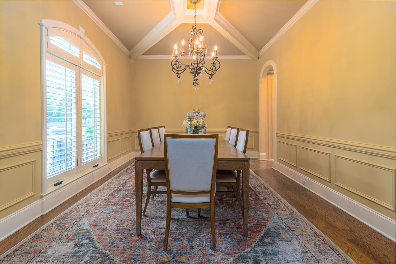 4600 Maple Glen Court Lakeland, TN 38002 - Photo 13 of 40 a view of a dining room with furniture a chandelier and wooden floor