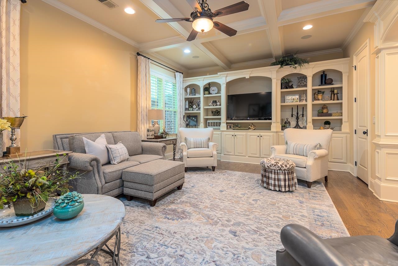 4600 Maple Glen Court Lakeland, TN 38002 - Photo 18 of 40 a living room with furniture or window and a flat screen tv