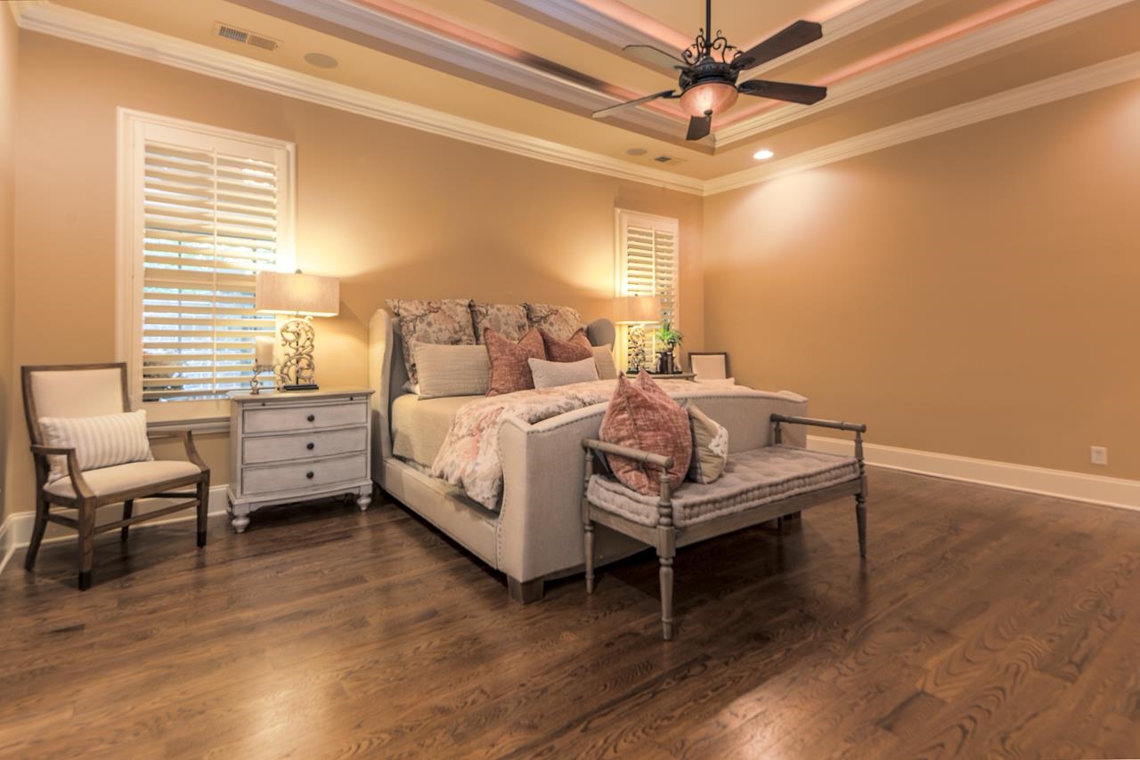 4600 Maple Glen Court Lakeland, TN 38002 - Photo 19 of 40 a bedroom with a bed and a chair