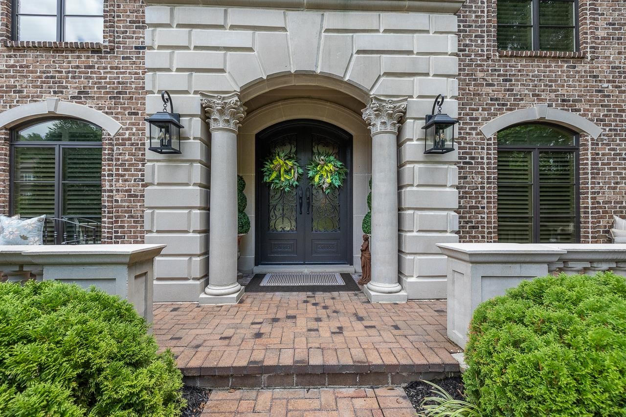 4600 Maple Glen Court Lakeland, TN 38002 - Photo 2 of 40 a front view of a house with garden