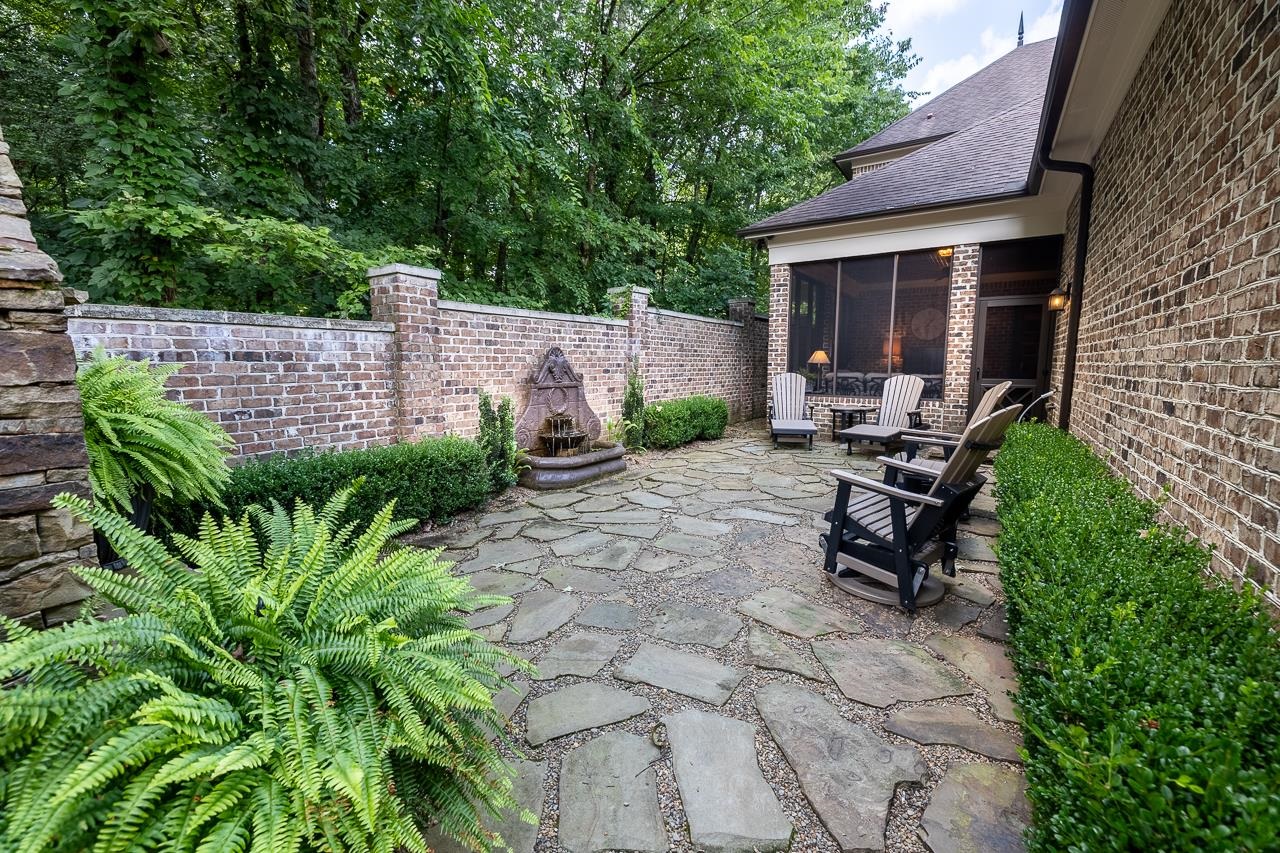 4600 Maple Glen Court Lakeland, TN 38002 - Photo 25 of 40 a view of a chairs and table in backyard of the house