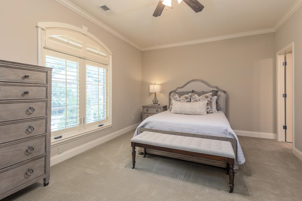 4600 Maple Glen Court Lakeland, TN 38002 - Photo 28 of 40 a spacious bedroom with a bed and a window