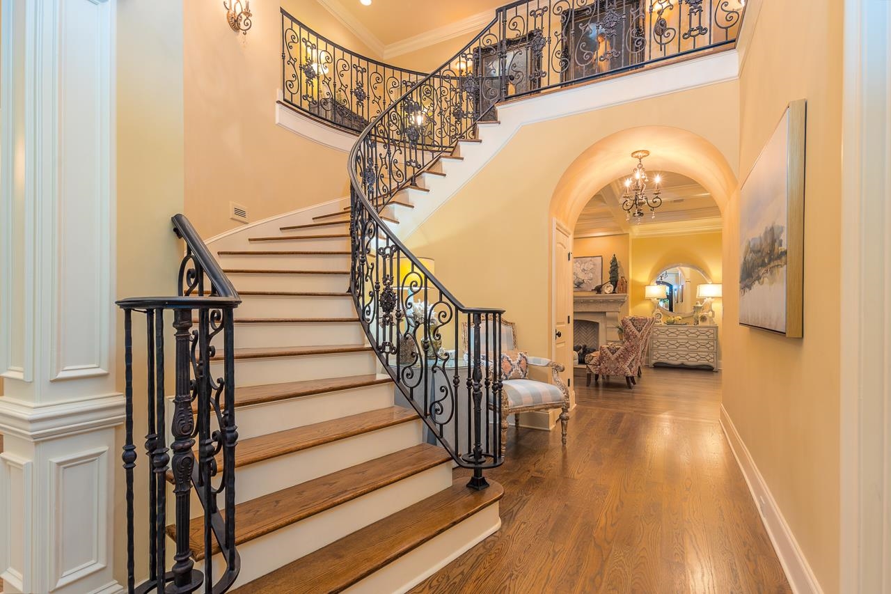4600 Maple Glen Court Lakeland, TN 38002 - Photo 3 of 40 a view of a livingroom with wooden floor and stairs