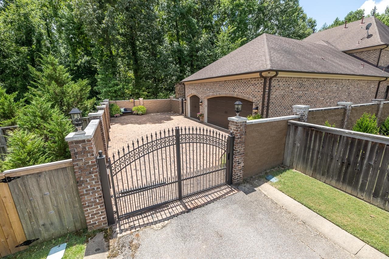 4600 Maple Glen Court Lakeland, TN 38002 - Photo 38 of 40 a house view with a garden
