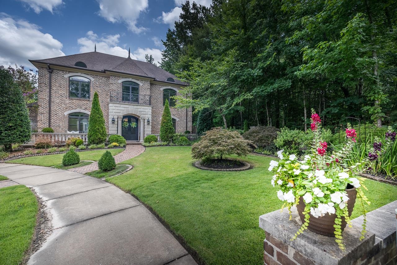 4600 Maple Glen Court Lakeland, TN 38002 - Photo 39 of 40 a front view of a house with a yard table and chairs