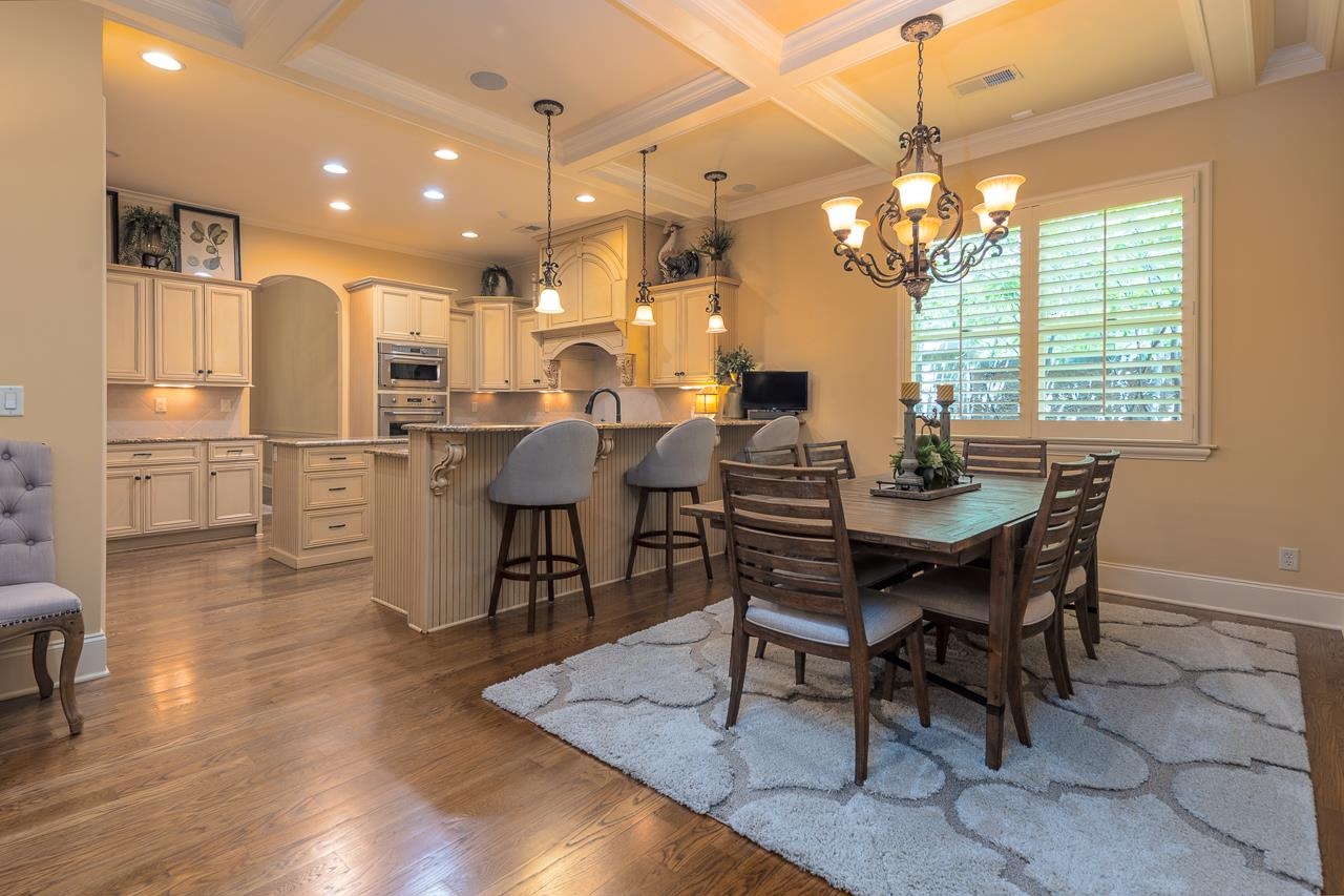 4600 Maple Glen Court Lakeland, TN 38002 - Photo 10 of 40 a view of a dining room with furniture window and wooden floor