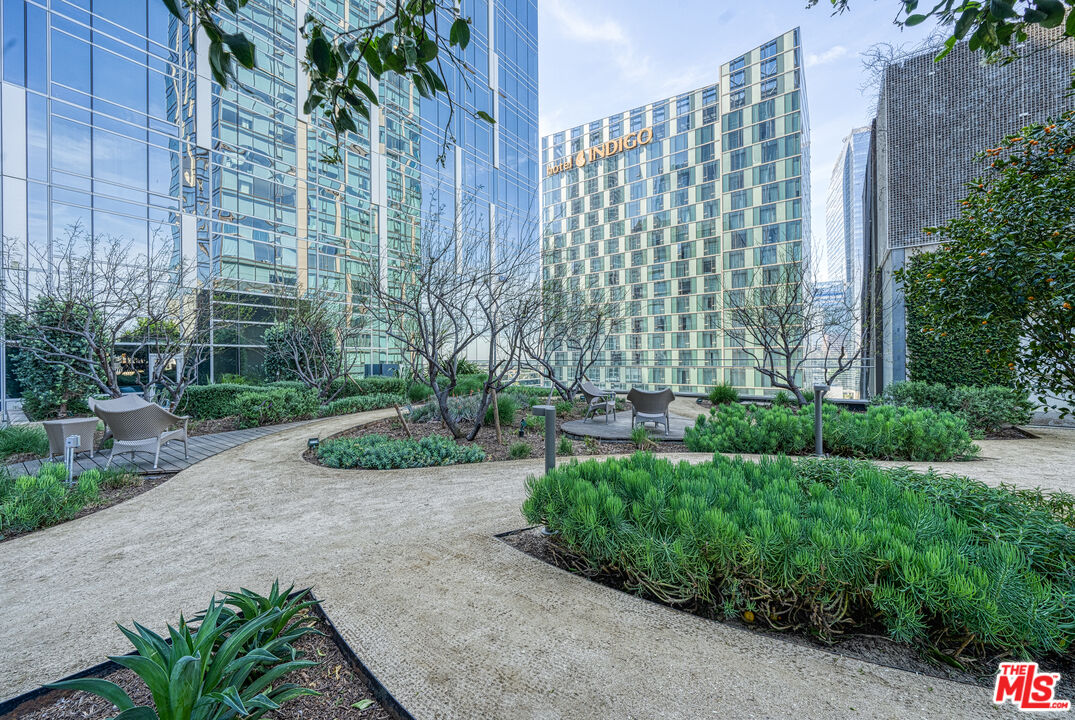 877 Francisco Street, Unit 1906 Los Angeles, CA 90017 - Photo 20 of 31 a view of a garden with a pathway