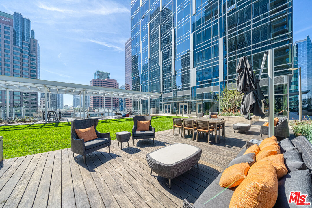 877 Francisco Street, Unit 1906 Los Angeles, CA 90017 - Photo 21 of 31 a view of swimming pool with outdoor seating