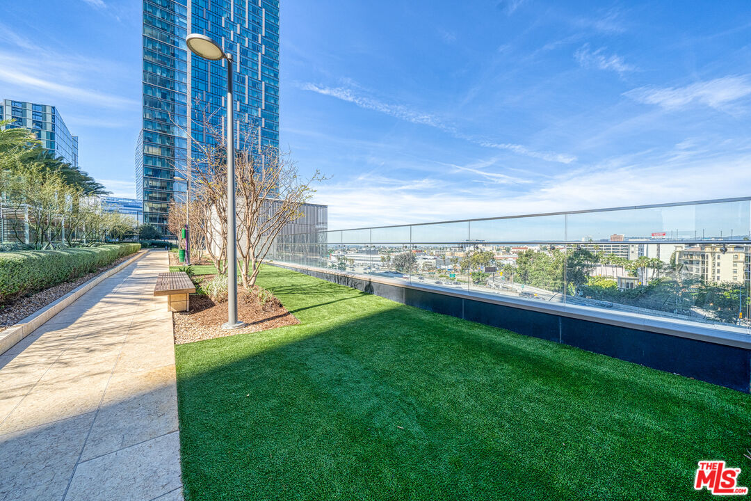 877 Francisco Street, Unit 1906 Los Angeles, CA 90017 - Photo 22 of 31 a view of swimming pool with a yard