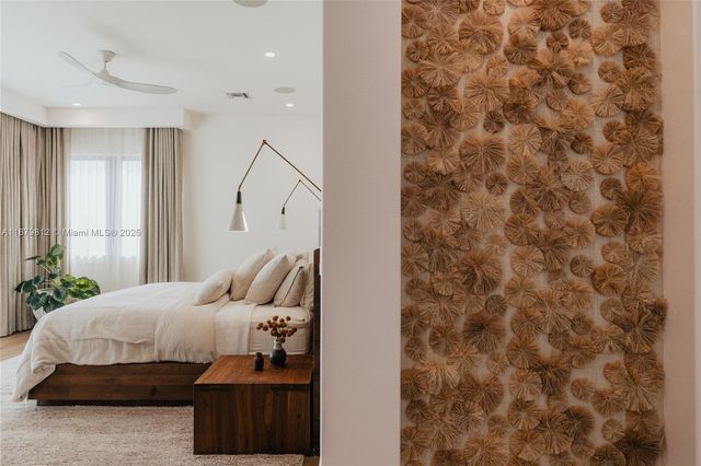 a view of a lake with couches chairs