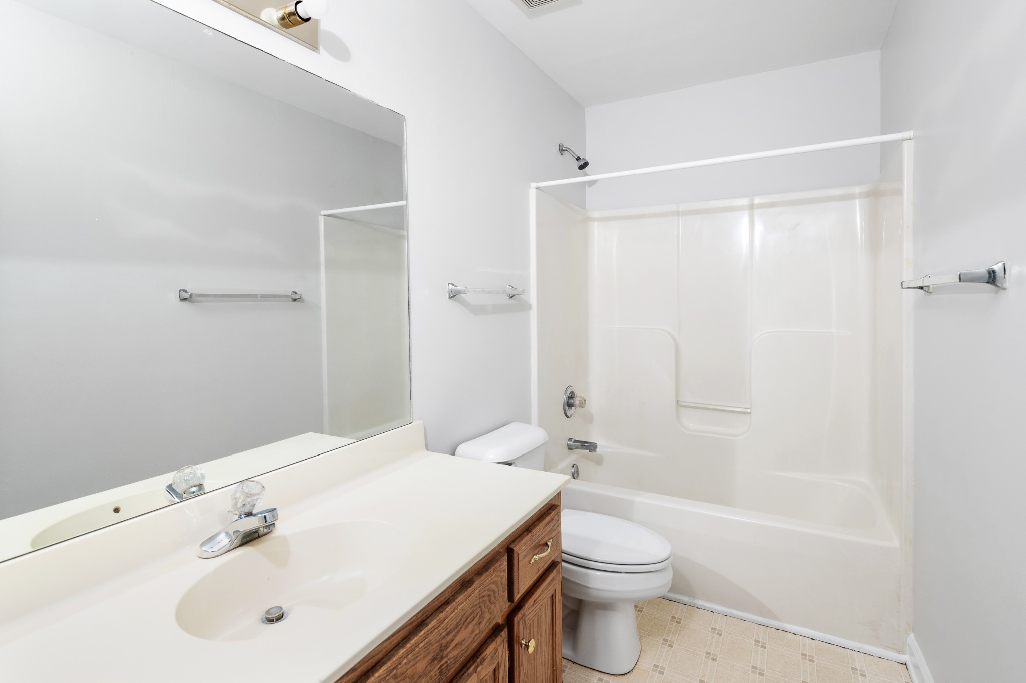 2849 Cochran Trace Drive Spring Hill, TN 37174 - Photo 11 of 27 a bathroom with a sink a toilet and shower