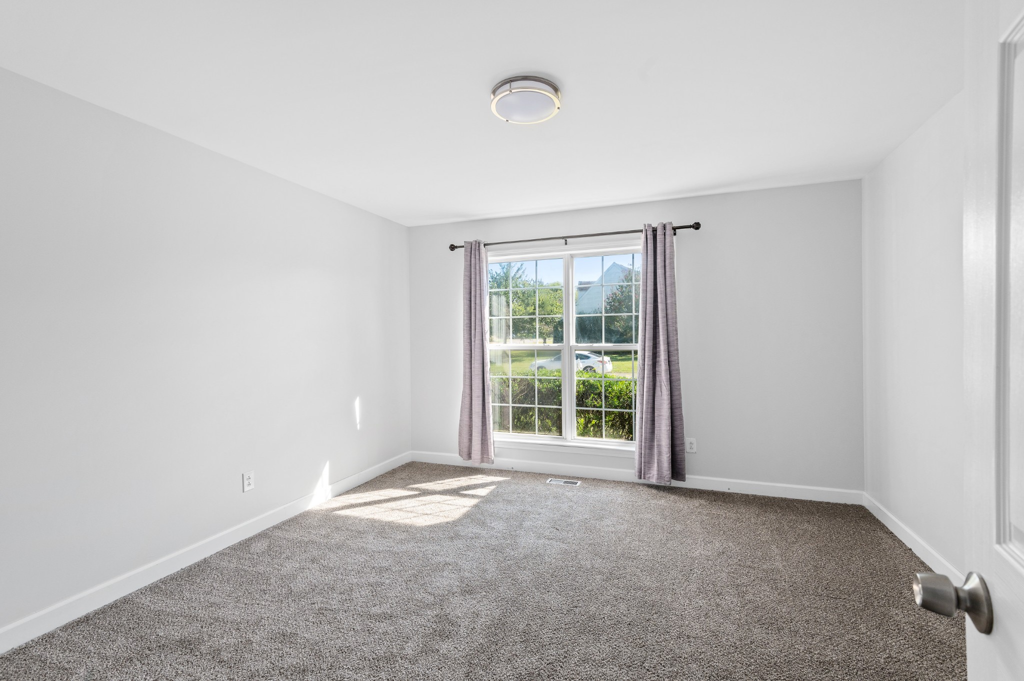 2849 Cochran Trace Drive Spring Hill, TN 37174 - Photo 15 of 27 an empty room with windows