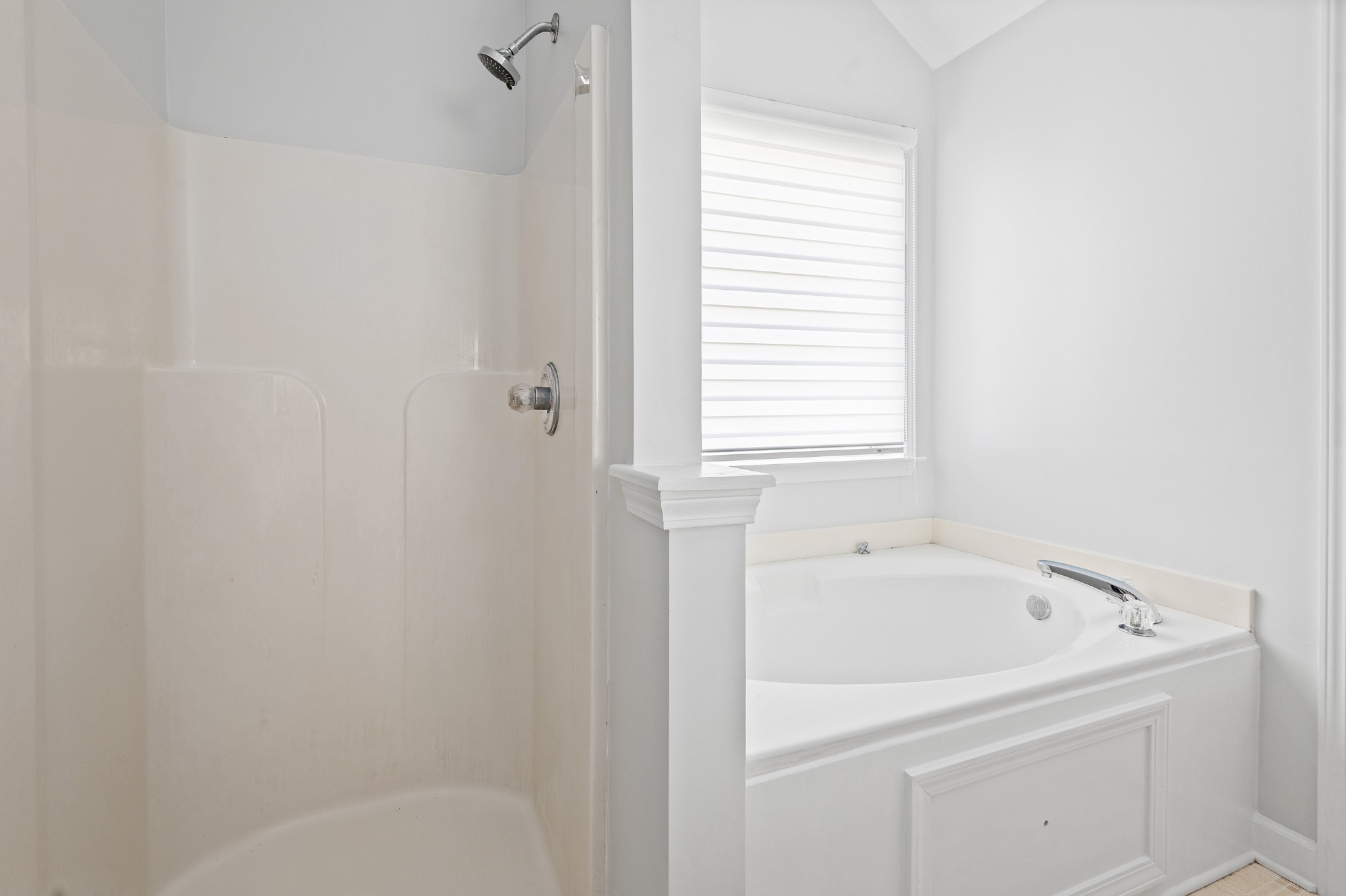 2849 Cochran Trace Drive Spring Hill, TN 37174 - Photo 21 of 27 a white bath tub sitting next to a window