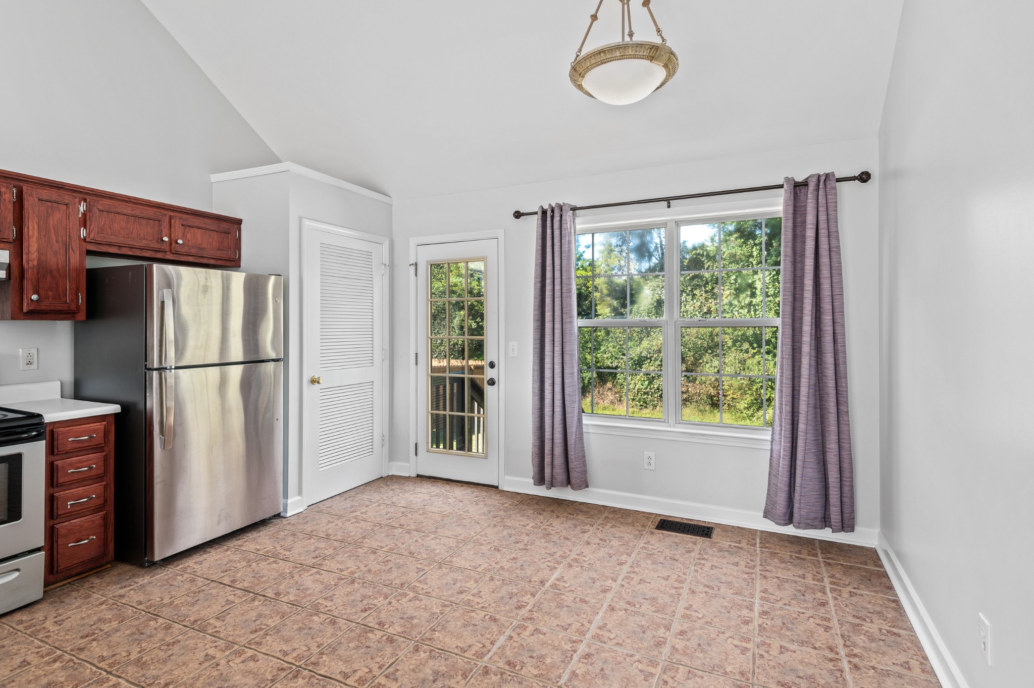 2849 Cochran Trace Drive Spring Hill, TN 37174 - Photo 7 of 27 a view of empty room with wooden floor and fan