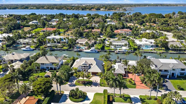 an aerial view of a house with swimming pool