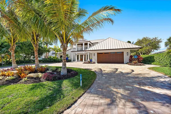 a front view of a house with entertaining space