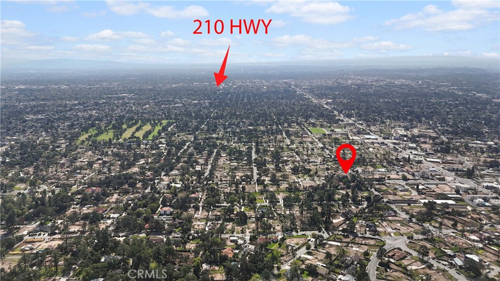 2560 Maiden Lane Altadena, CA 91001 - Photo 12 of 19 a view of a room with a plant and trees in the background