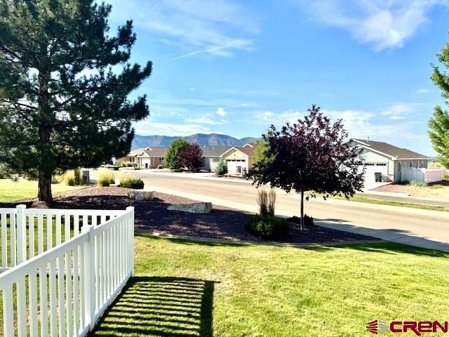 802 Bluffs Boulevard Cortez, CO 81321 - Photo 25 of 30 a view of a swimming pool with an outdoor space