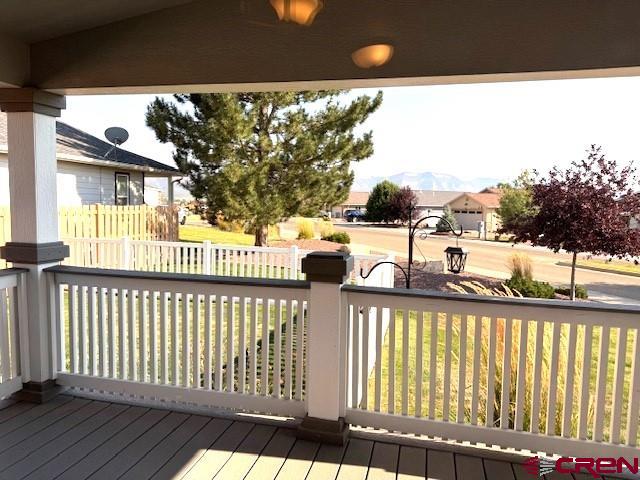 802 Bluffs Boulevard Cortez, CO 81321 - Photo 26 of 30 a view of a porch and a yard