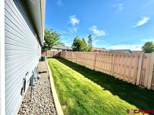 a view of balcony with yard