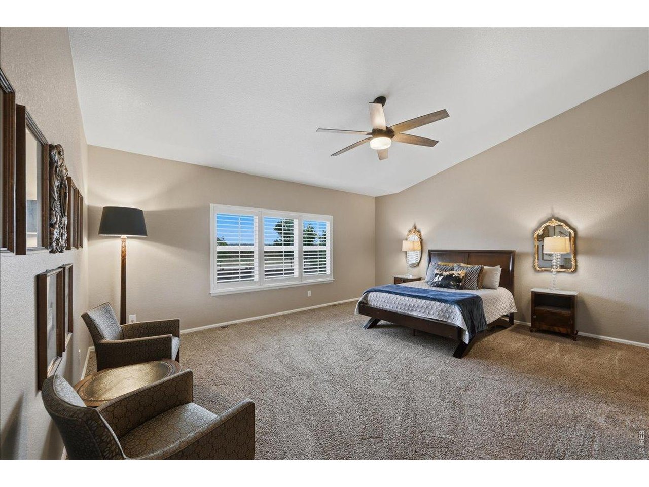 6096 Story Road Timnath, CO 80547 - Photo 16 of 50 a bedroom with furniture and a window