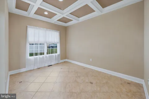 a living room with fireplace furniture and a flat screen tv