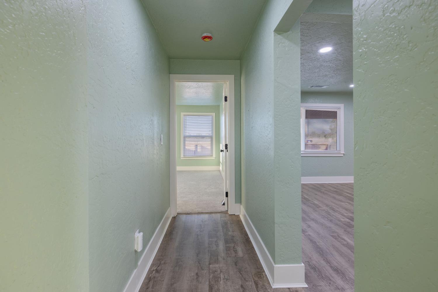 4722 East Florence Avenue Fresno, CA 93725 - Photo 30 of 51 a view of a hallway