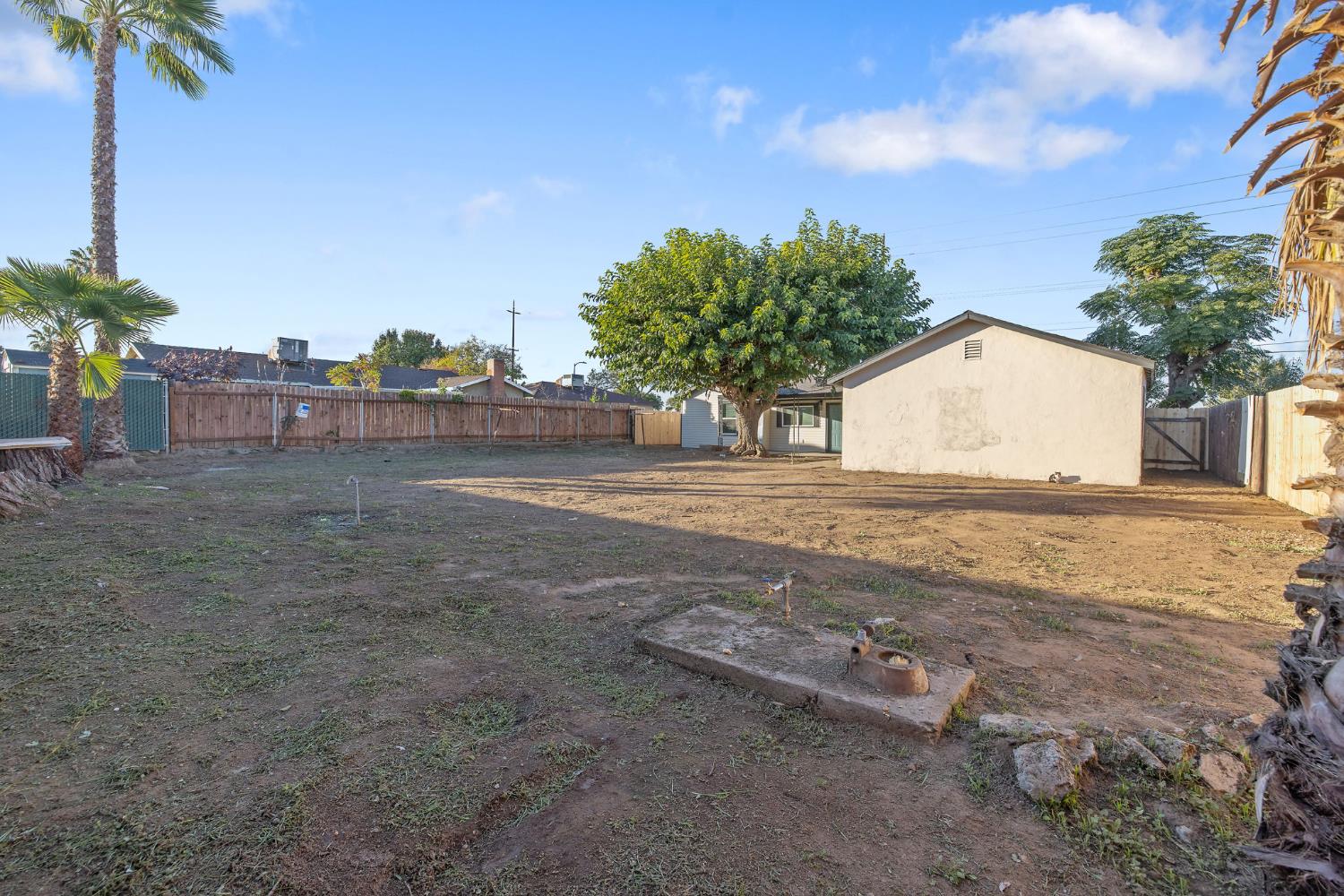4722 East Florence Avenue Fresno, CA 93725 - Photo 43 of 51 a view of a yard with a house