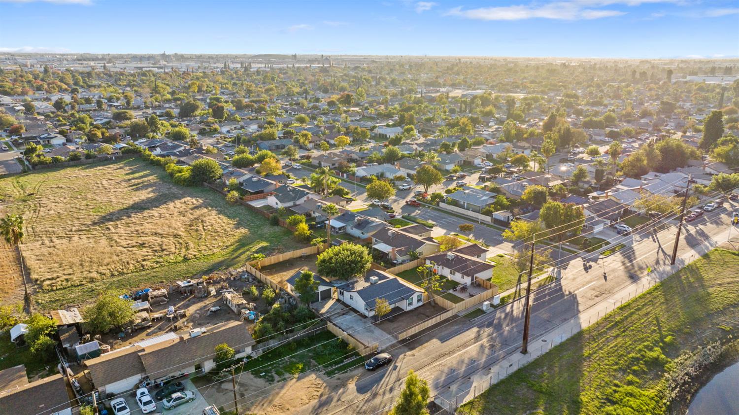 4722 East Florence Avenue Fresno, CA 93725 - Photo 50 of 51 an aerial view of residential building with parking space
