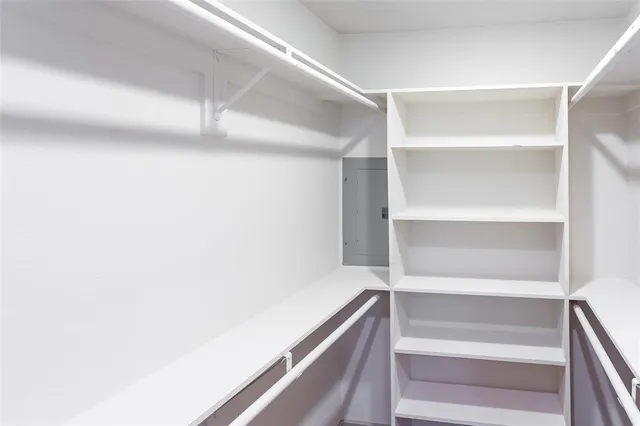 a view of an empty walk in closet