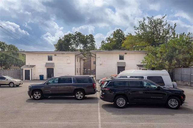 a view of a car in front of a house