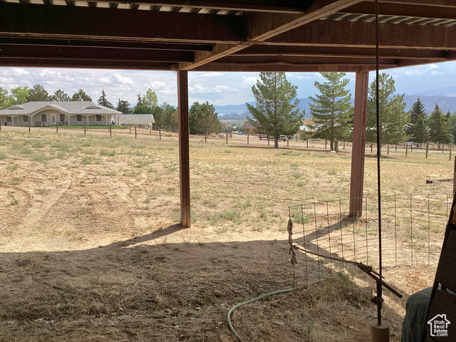 3 Red Circle, Unit 19 Manila, UT 84046 - Photo 17 of 29 View of yard with a mountain view, a rural view, and a pergola