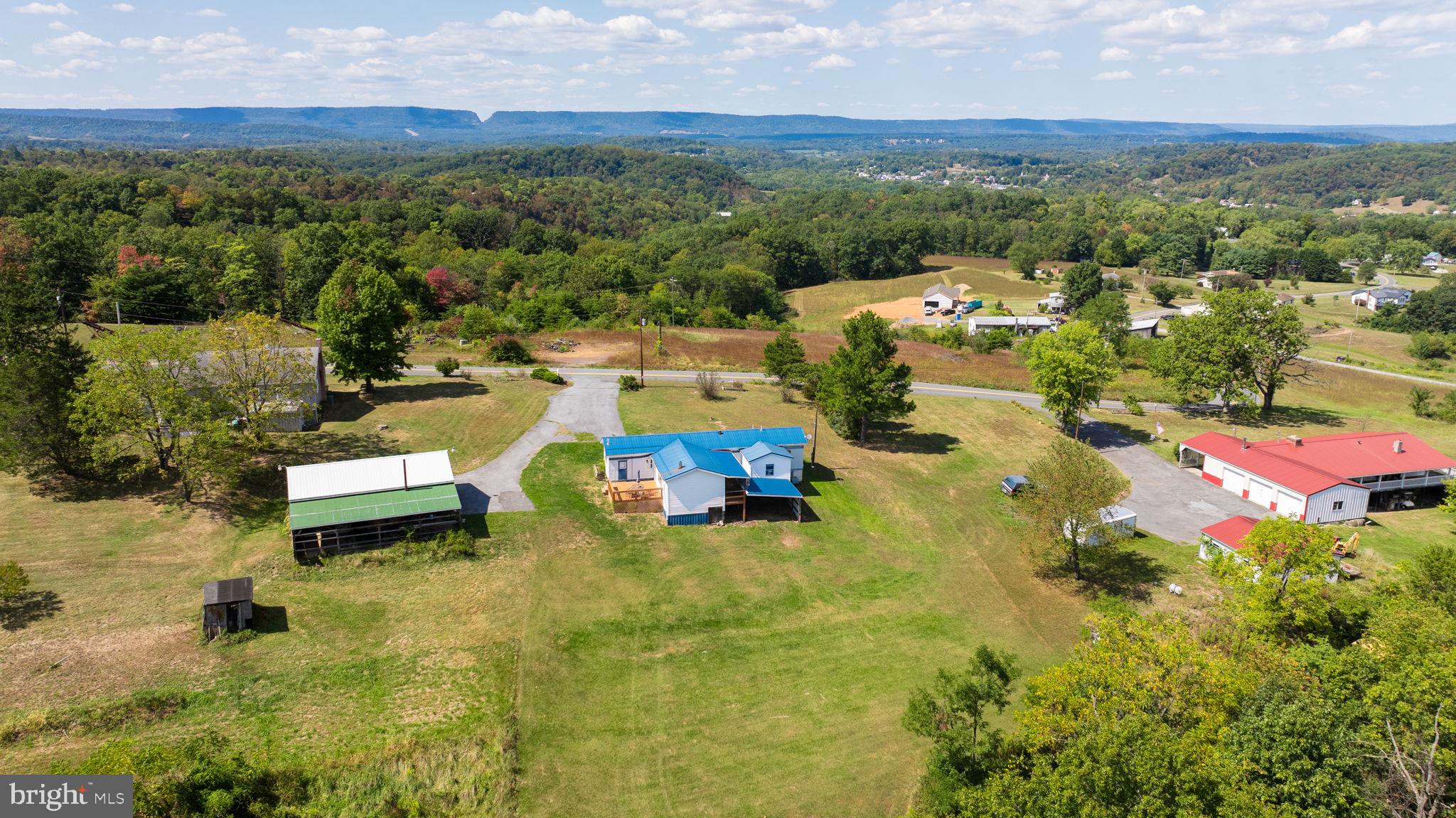 5386 Pious Ridge Road Berkeley Springs, WV 25411 - Photo 19 of 20 a view of a city with houses