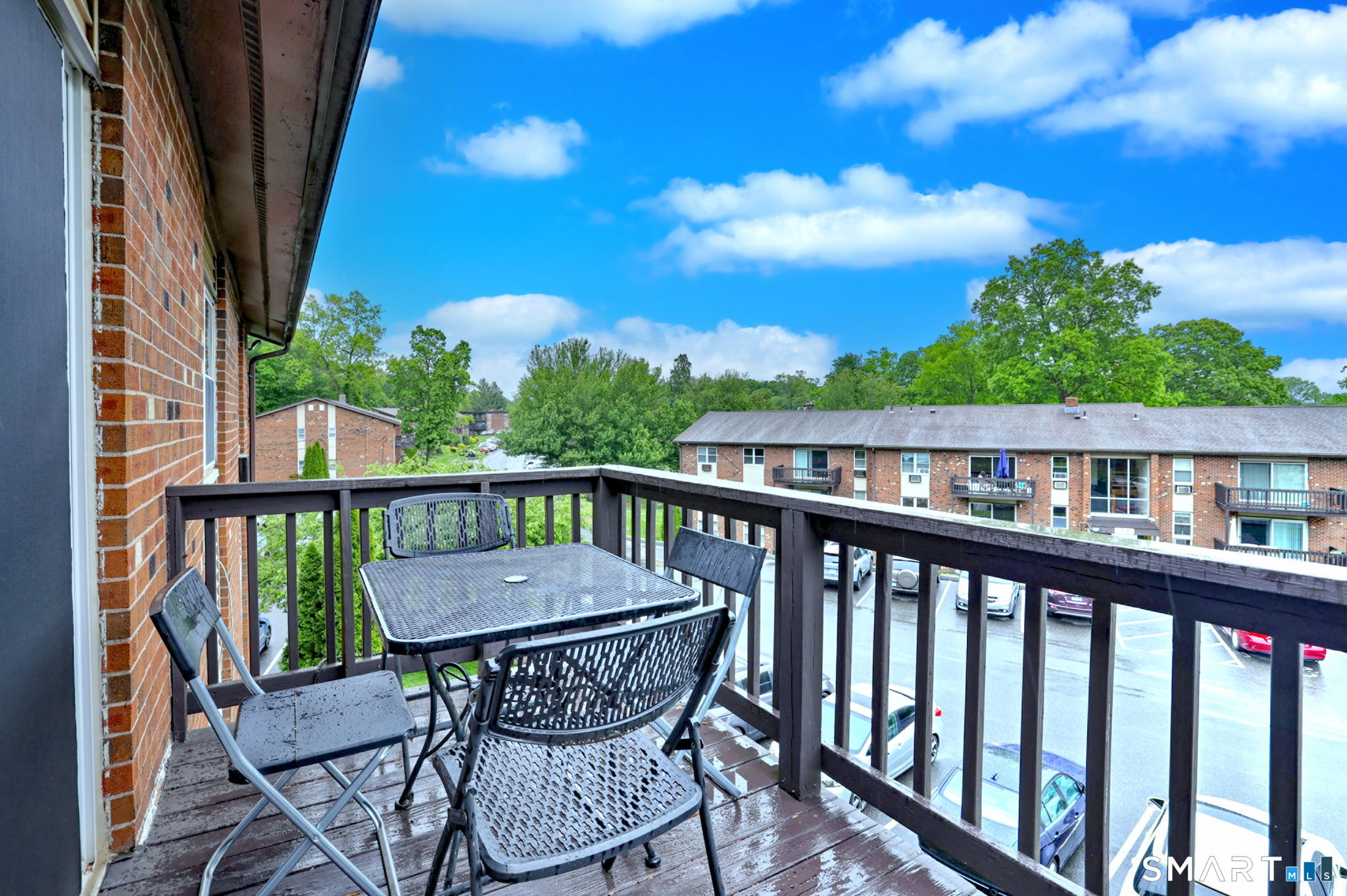 43 Balance Rock Road, Unit 11 Seymour, CT 06483 - Photo 34 of 40 a view of a balcony with wooden floor and outdoor space