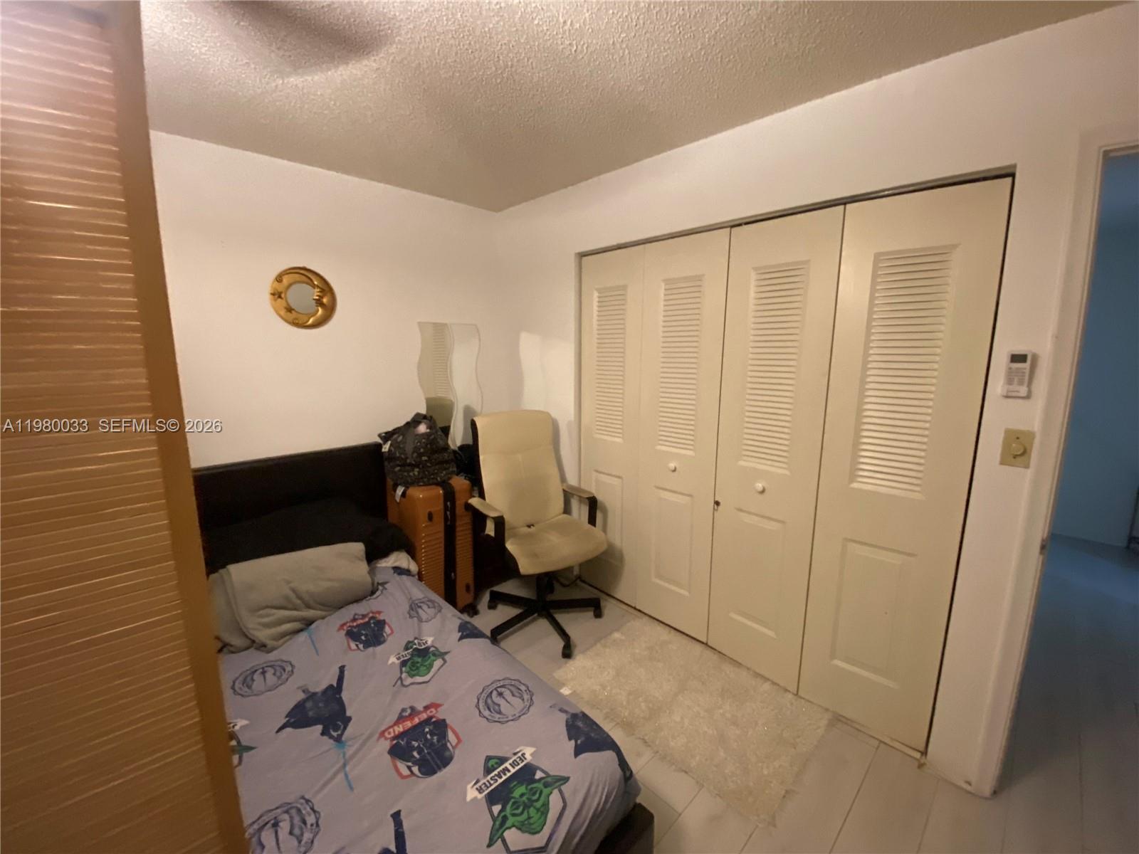 13815 Southwest 54th Street Miami, FL 33175 - Photo 17 of 23 a bathroom with a sink and a mirror