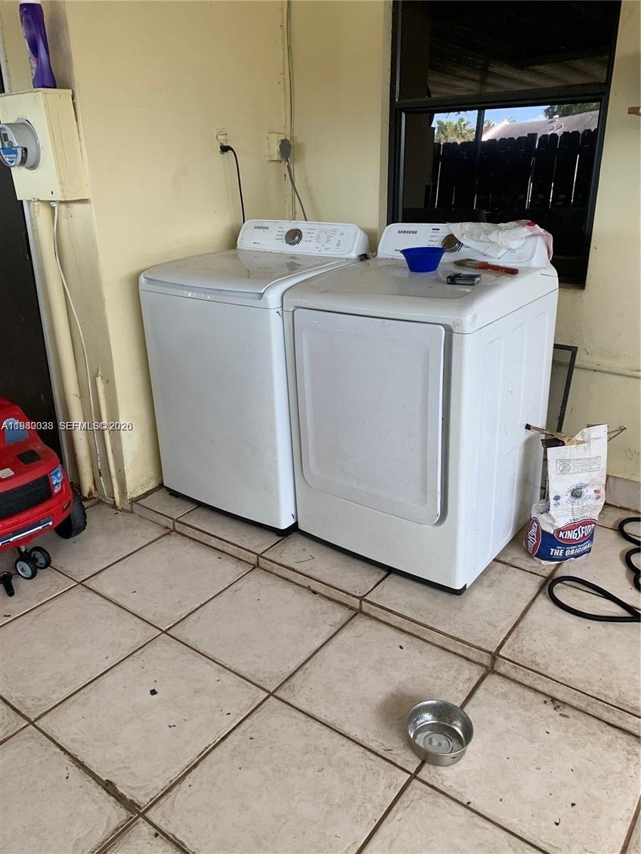 13815 Southwest 54th Street Miami, FL 33175 - Photo 22 of 23 a utility room with dryer and washer