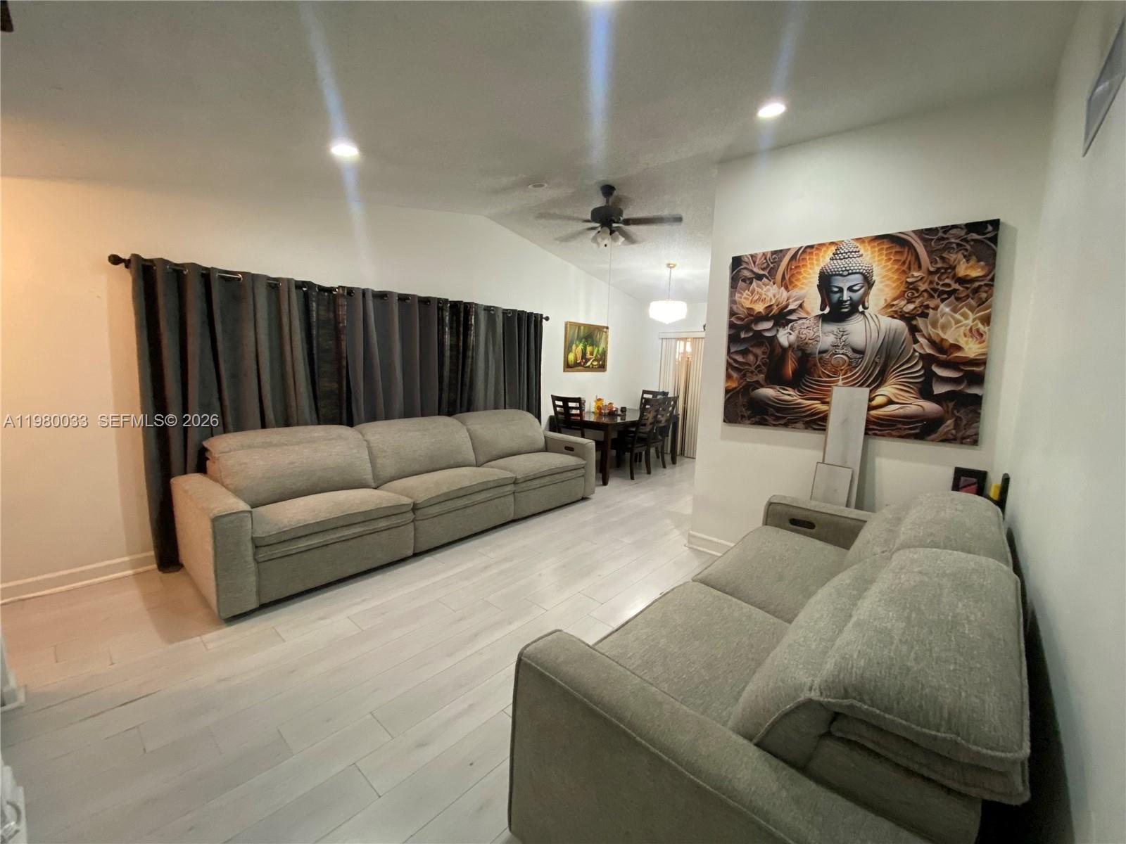 13815 Southwest 54th Street Miami, FL 33175 - Photo 4 of 23 a living room with furniture and wooden floor