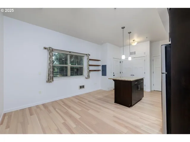 a bathroom with a sink toilet tub and shower